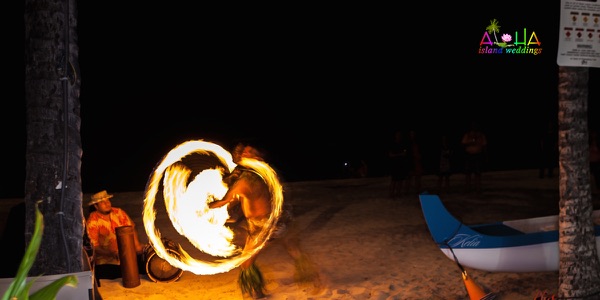 A fire knife dancer at the reception, another moment