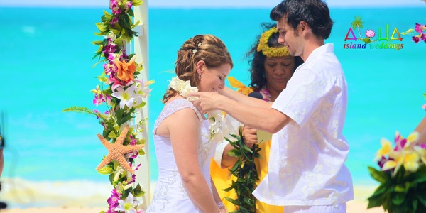The groomsmen in bright aloha shirts on the beach, one more moment