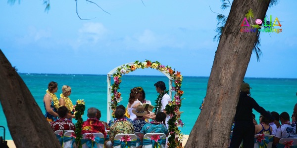 The bridal party on the sand