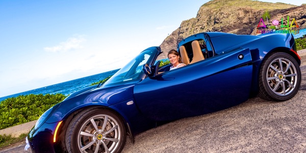 Jennifer and David with the blue Lotus sports car by the sea, more from the day