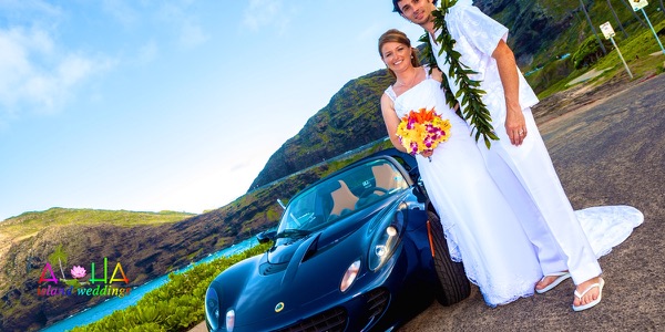 Jennifer and David in the Lotus sports car, photo 2