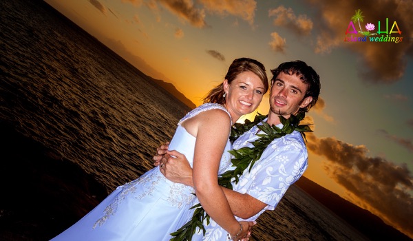 Jennifer and David in silhouette at sunset, another view