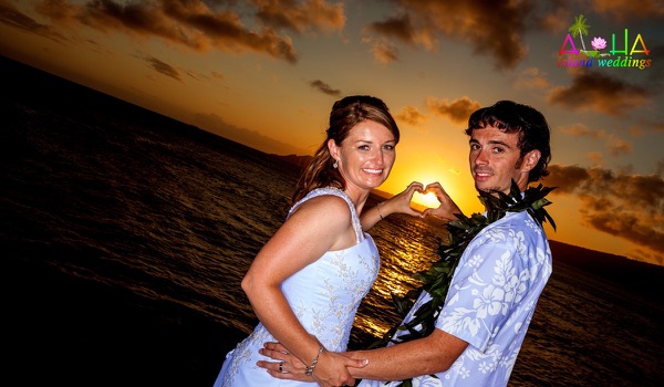 Jennifer and David in silhouette at sunset, one more moment