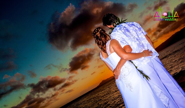 Jennifer and David in silhouette at sunset, a different view