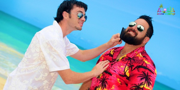 A groomsman helping David with his lei