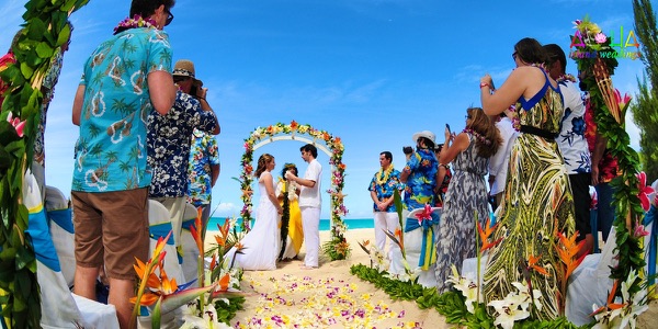 Jennifer and David at the flower arch, another view