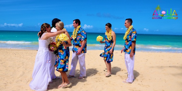 Guests watching the ceremony by the turquoise water, more from the day