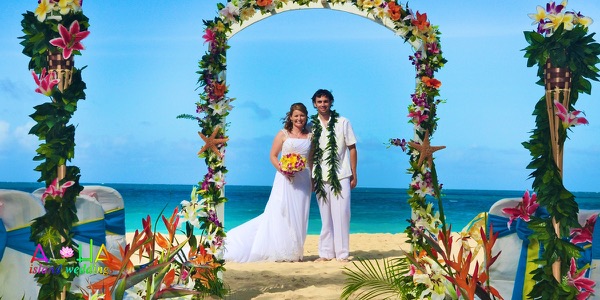 Guests watching the ceremony by the turquoise water, photo 3