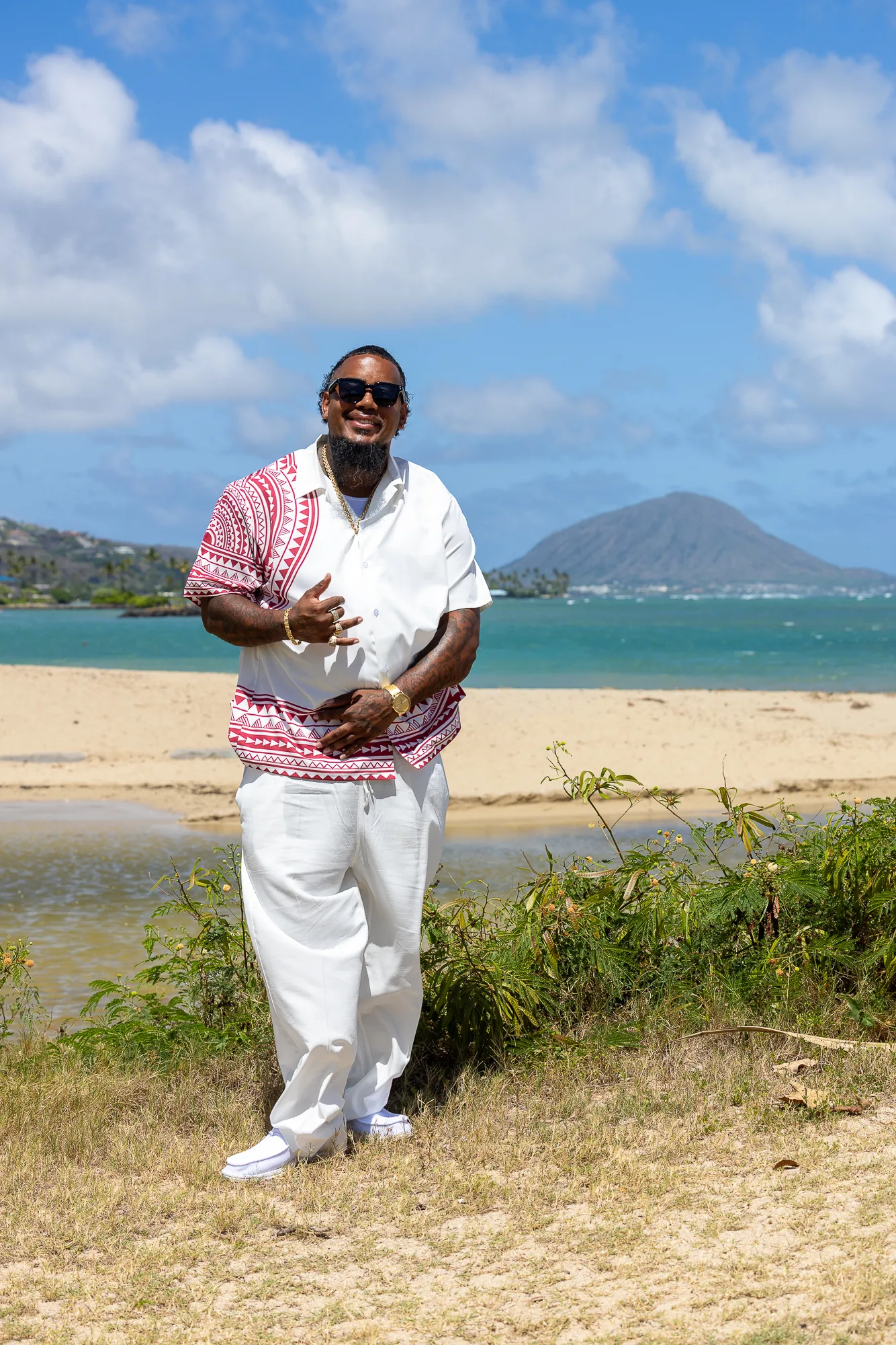 Erick standing by the ocean before the ceremony