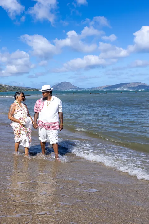 The couple in the shallow water