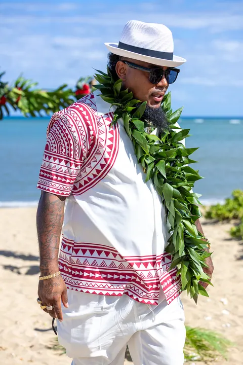 Erick in his long maile lei