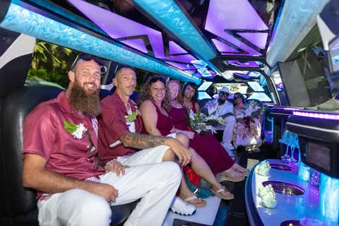 The groomsmen riding in the limo