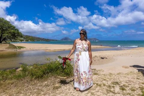 Jocelyn on the beach with the mountains behind