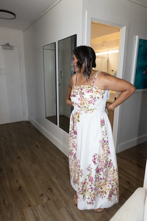 Jocelyn ready in her ivory floral dress
