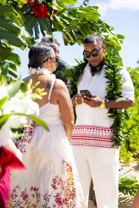 Reading their vows to each other