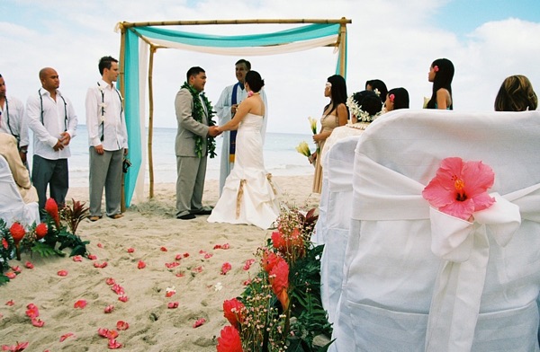 Jo and Rey during their ceremony at the gazebo, close up