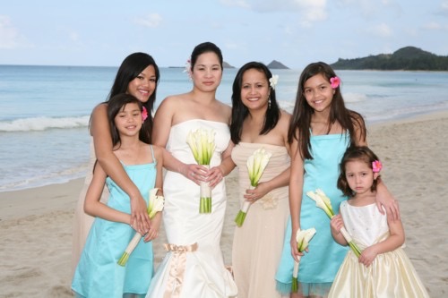 Jo and Rey with their bridal party, in the sunshine