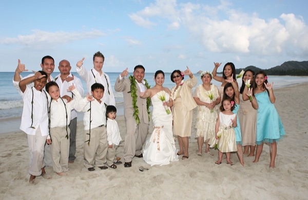 Jo and Rey with their bridal party, laughing together