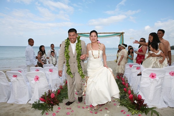 Jo and Rey's wedding ceremony, laughing together