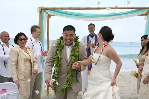 Jo and Rey during their ceremony at the gazebo, laughing together