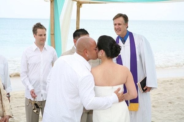 Jo and Rey during their ceremony at the gazebo, smiling