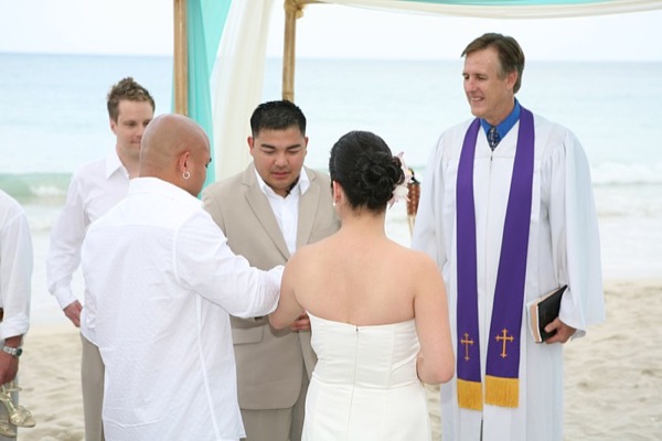 Jo and Rey with family at the gazebo, smiling