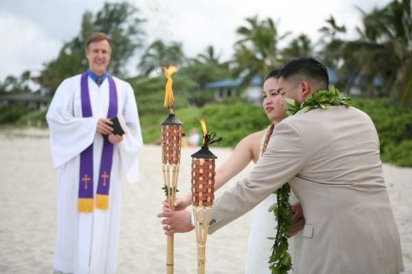 Jo and Rey during their ceremony at the gazebo, in the sunshine