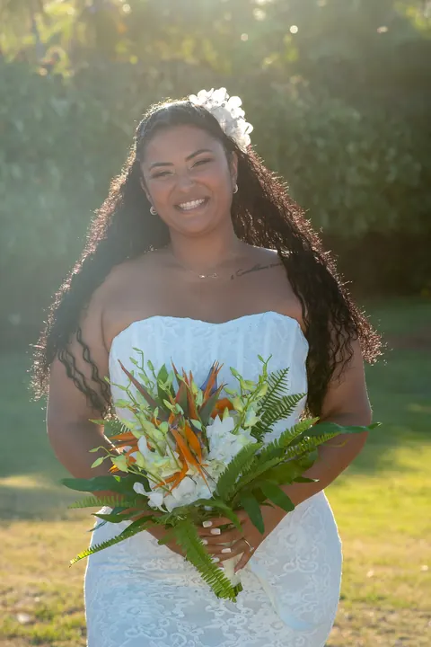 A bridal portrait of Dianna by the trees