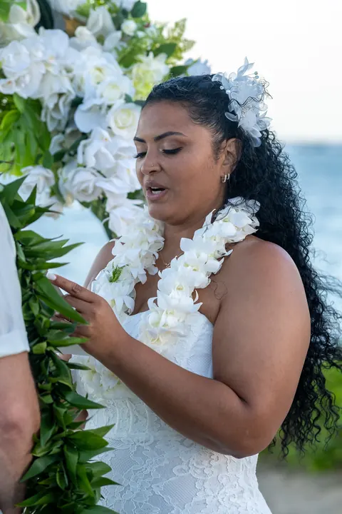 Dianna reading her vows by the ocean