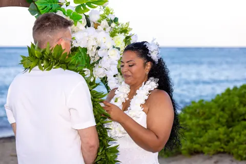 Dianna smiling as she reads her vows