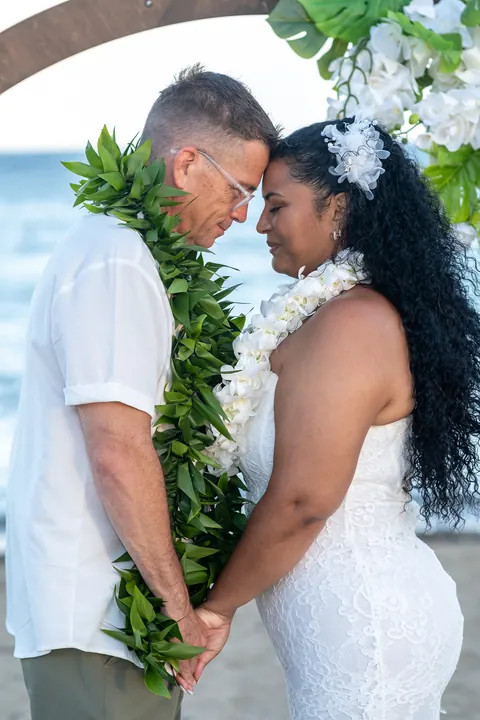 Holding hands after the ring exchange