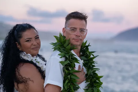 A portrait with the ocean at dusk
