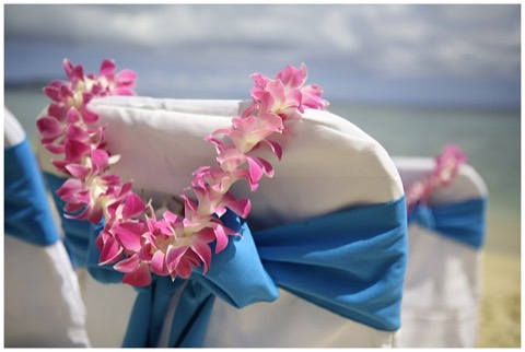 A light purple native orchid lei on a chair at a Diamond Head wedding
