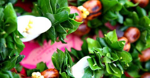 Green kukui nut shell leis for the men at a Hawaii wedding