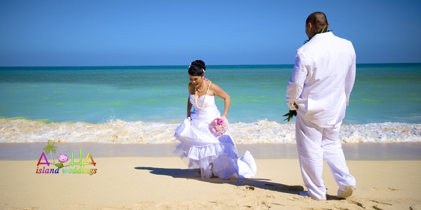 Leling and Jack celebrating on the beach after the wedding, one more moment