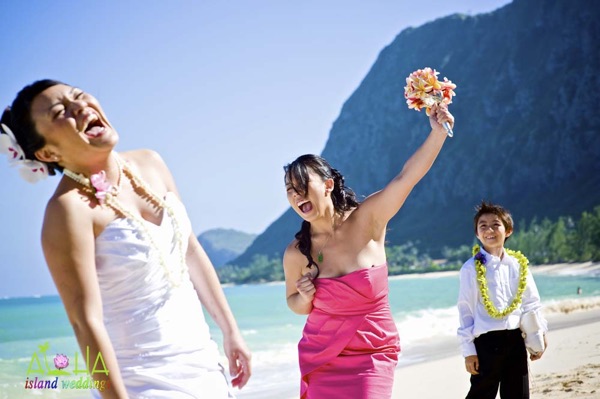 Leling laughing after bridesmaid caught her bouquet