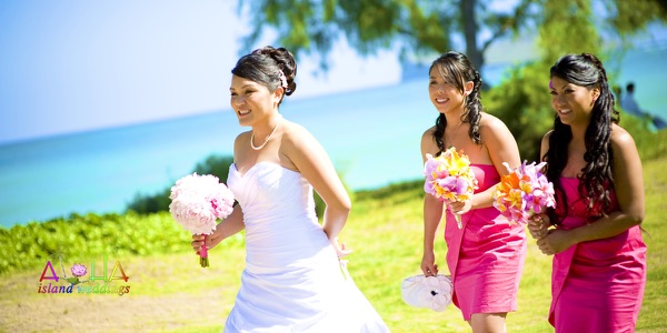 Guests watching the ceremony on the sand, a different view
