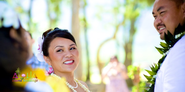 Guests watching the ceremony on the sand, one more moment