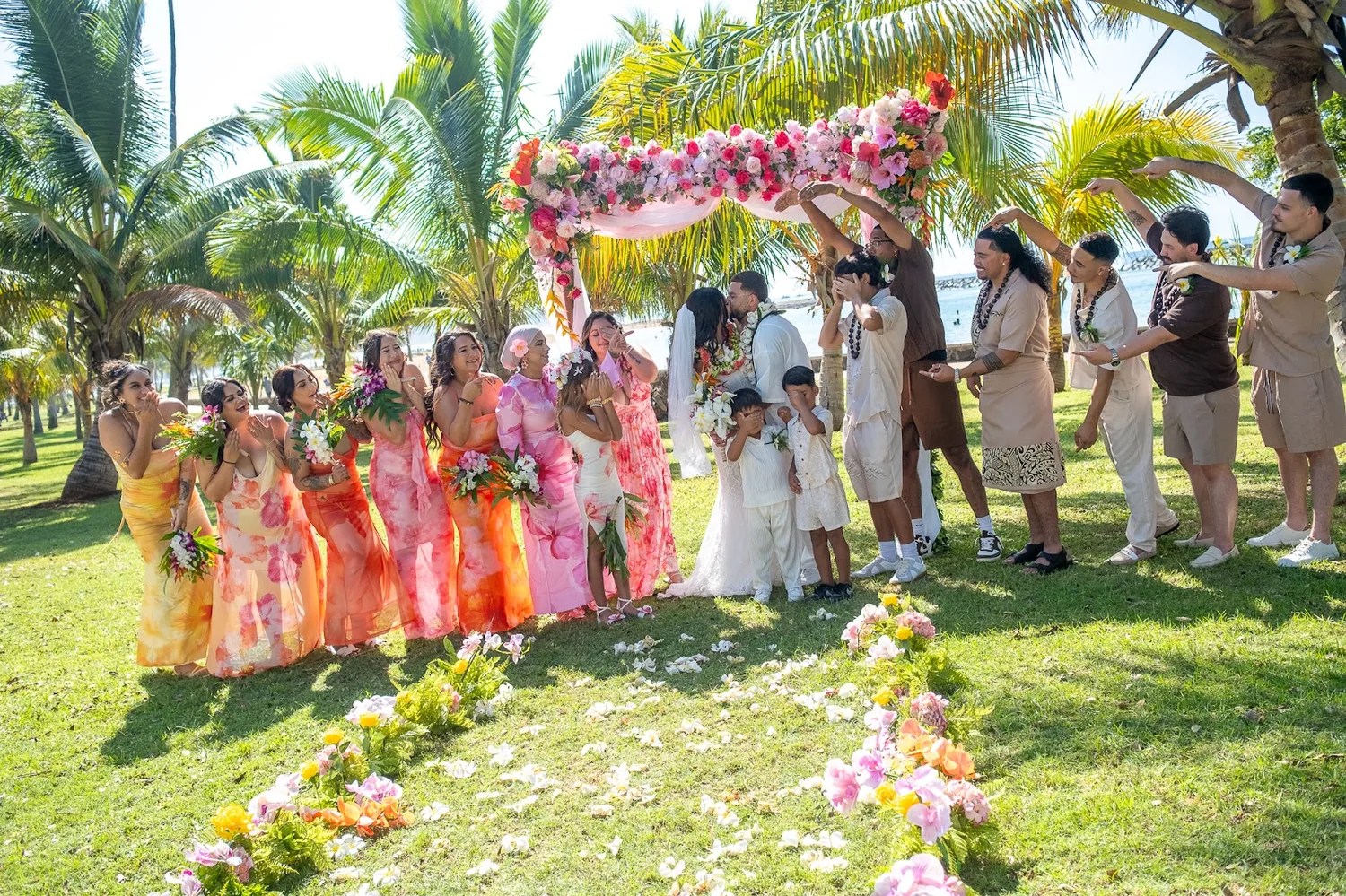 Bridesmaids and groomsmen with the couple