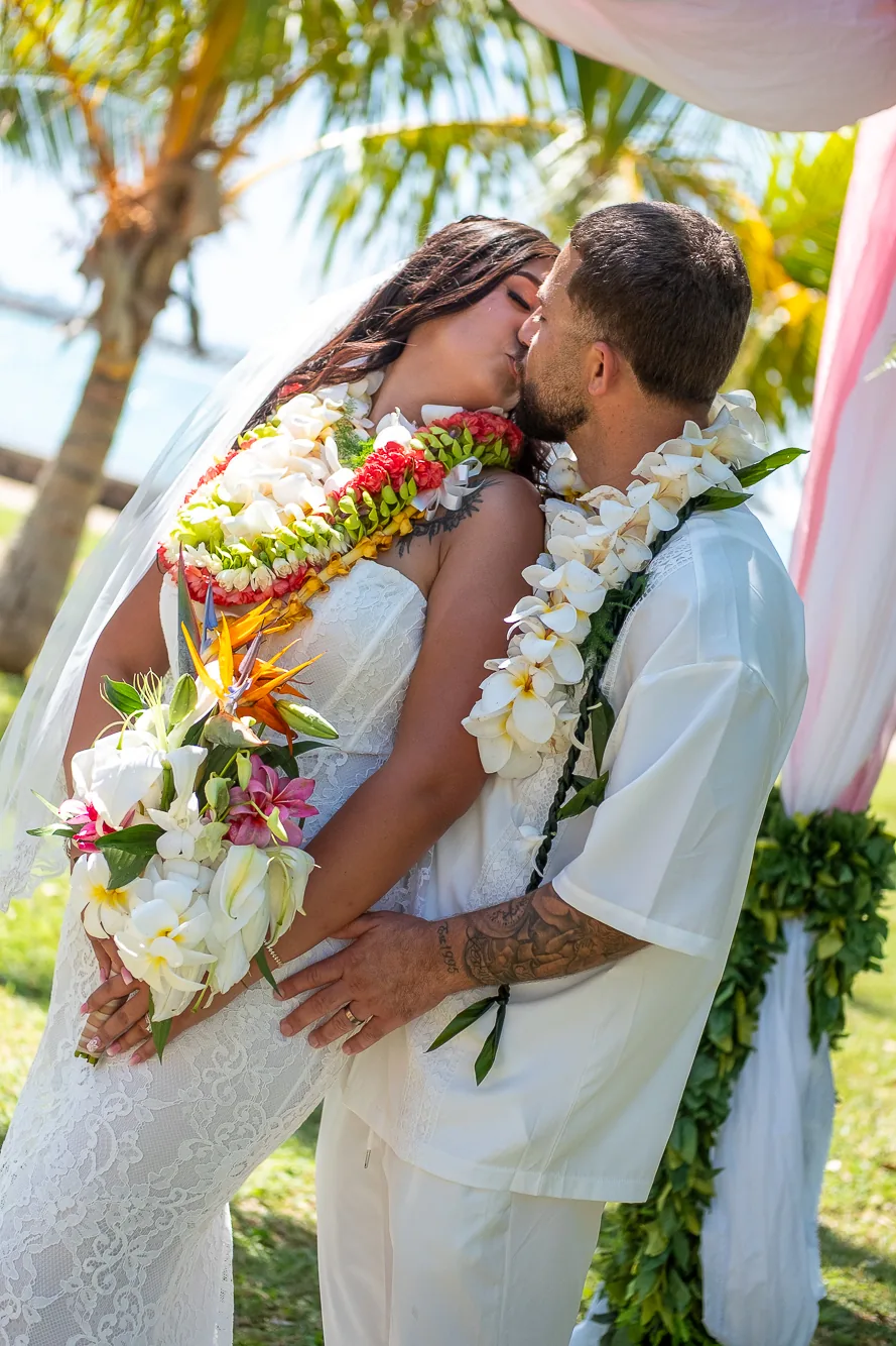 Close up of Lila and Mustafa in their leis