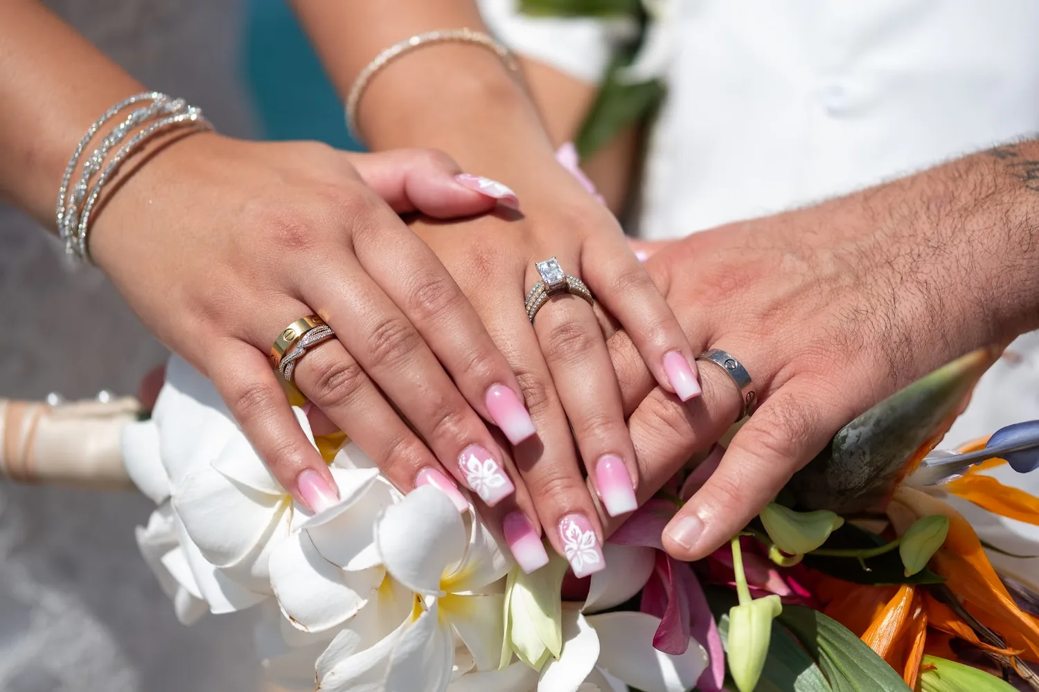 Close up of their rings and hands