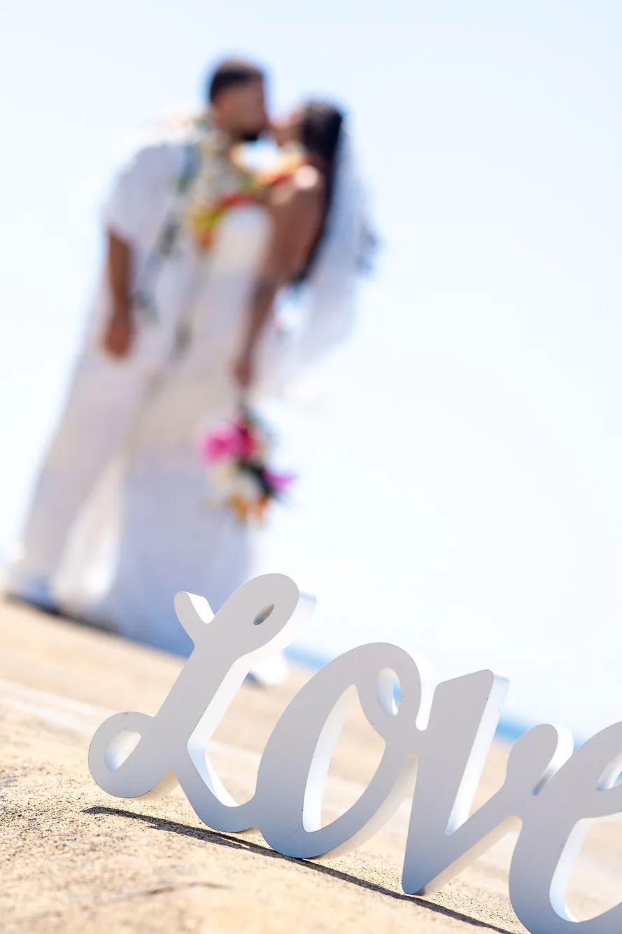 Detail of her veil and bouquet in the wind