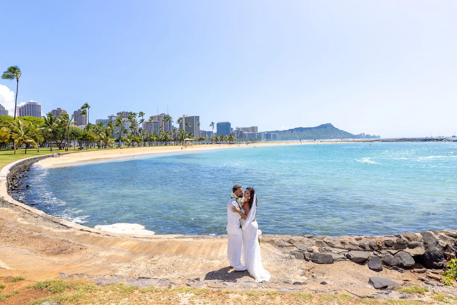 Lila and Mustafa by the turquoise lagoon