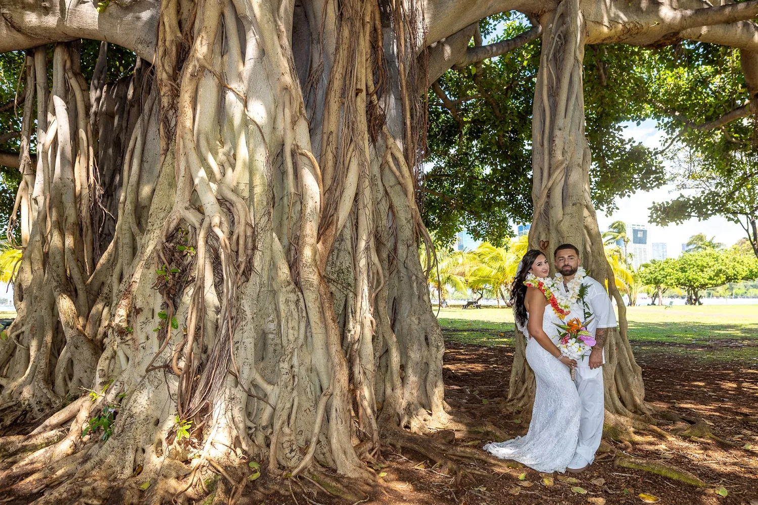 Lila and Mustafa under a giant banyan tree