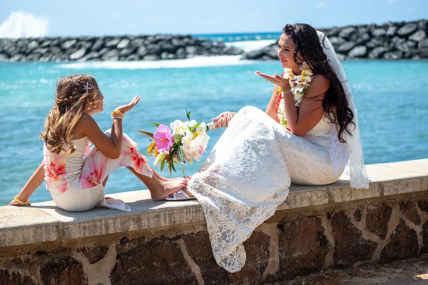 Lila and their daughter on the seawall