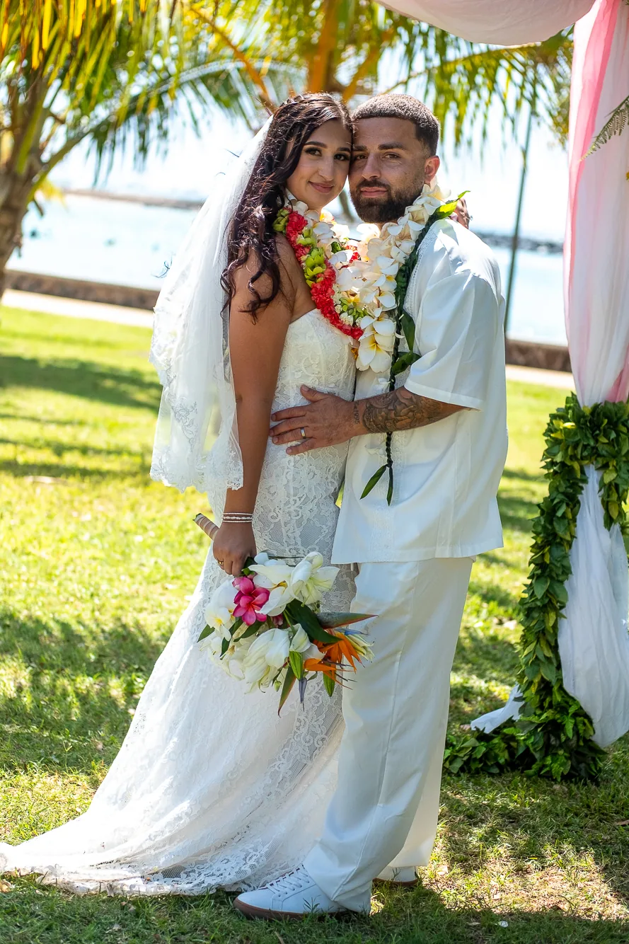 Lila holding her bouquet with Mustafa