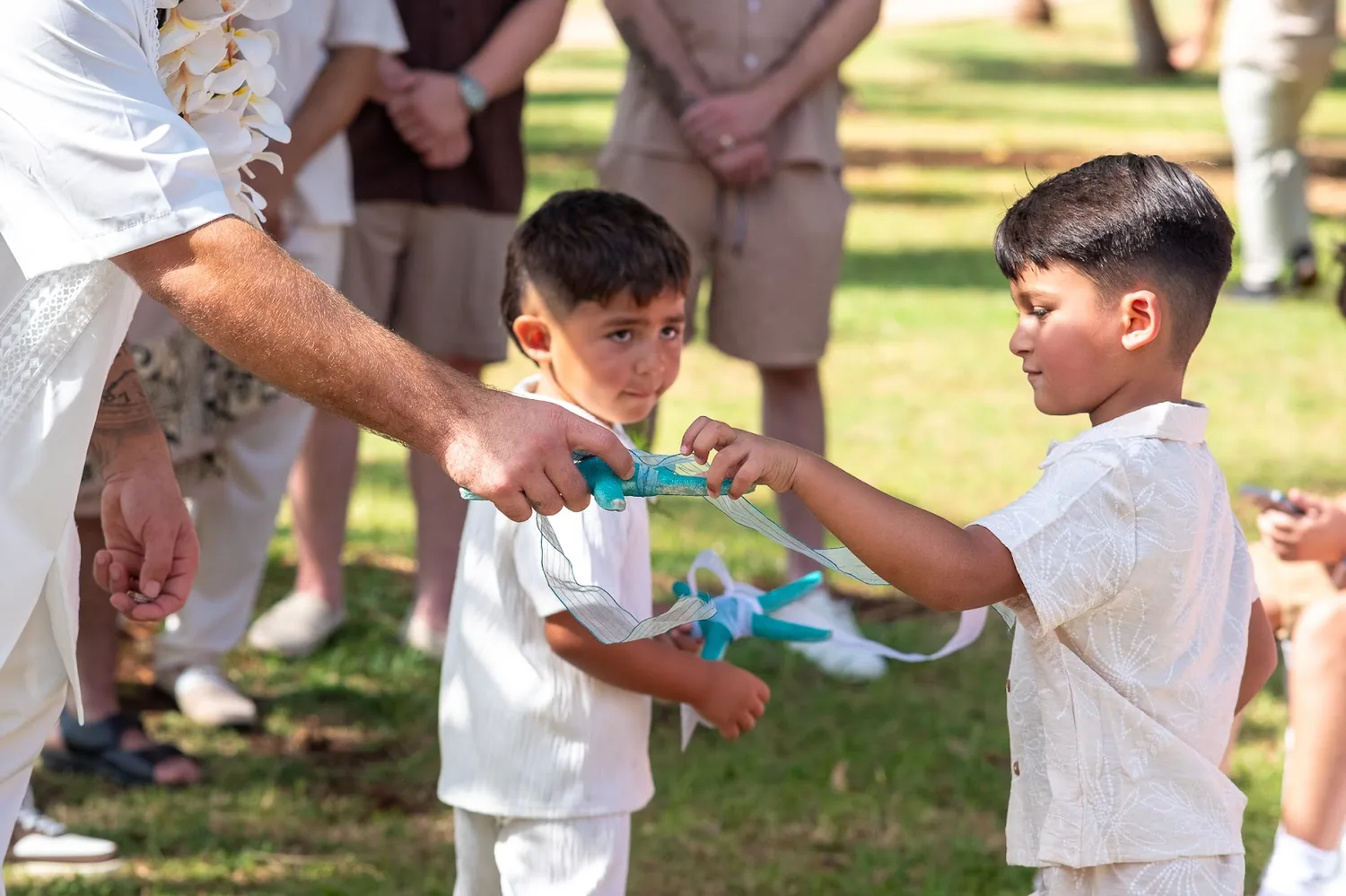 The children helping with the sand ceremony
