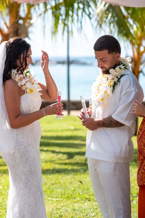 Lila looking at Mustafa during the vows