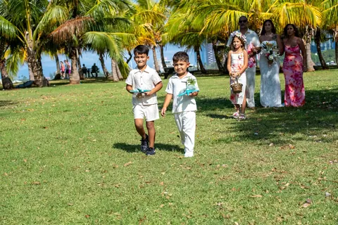Mustafa walking down the aisle with his mom