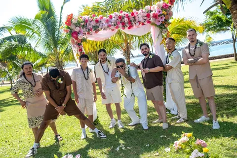The groomsmen with the couple
